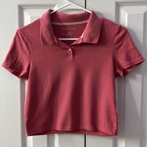 Red cropped collar shirt. Size medium in adult. America Eagle Outfitters.